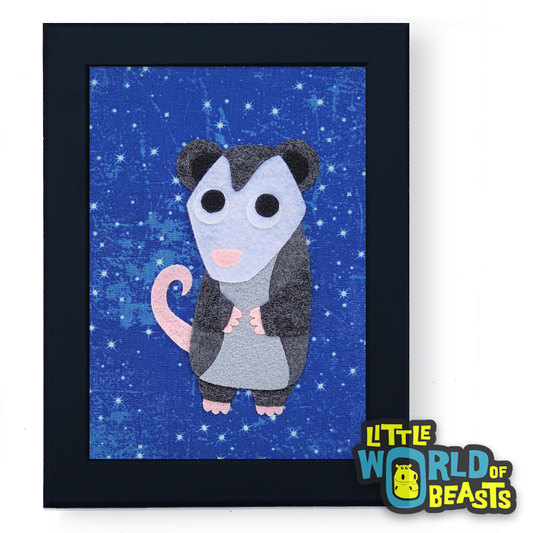 Framed artwork of a cartoon opossum on a blue starry background with 
