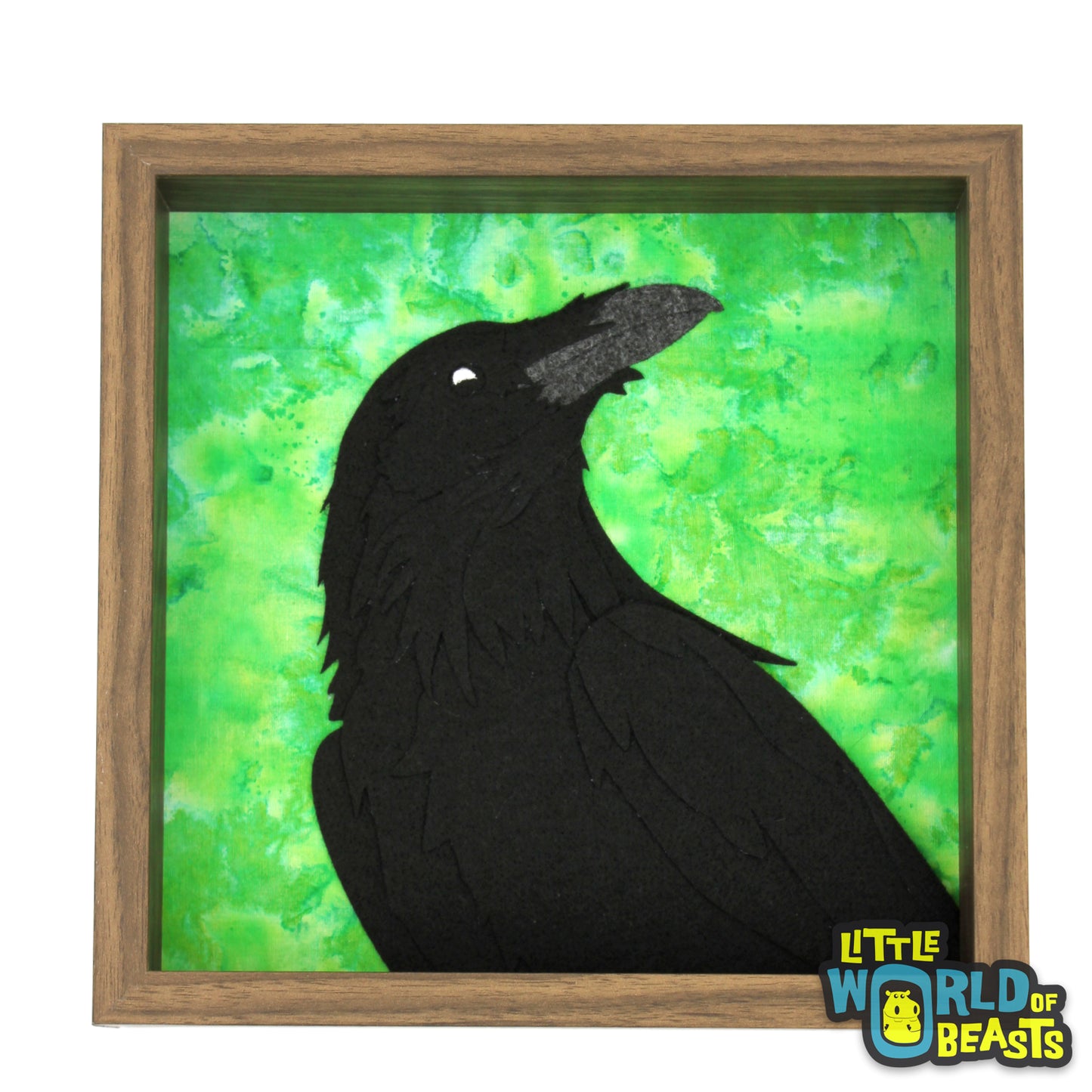 Felt Raven Portrait on a green background